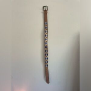 Tan belt with design